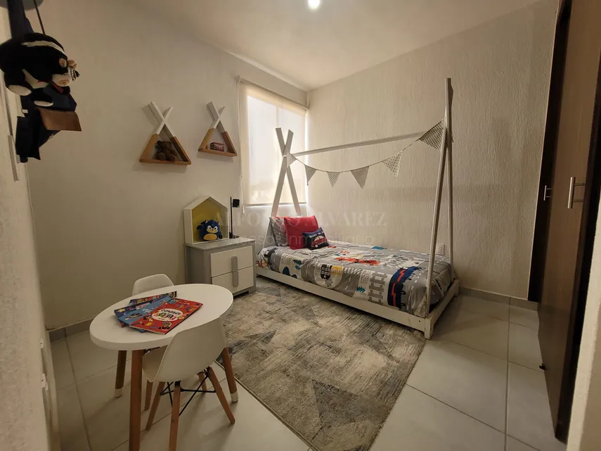 Recámara secundaria del departamento en Terralza