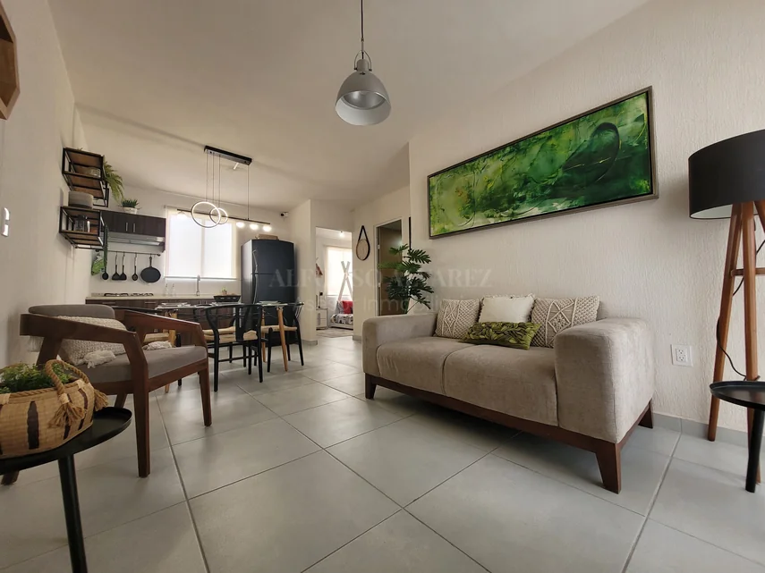 Sala y comedor del departamento de planta alta en Terralza